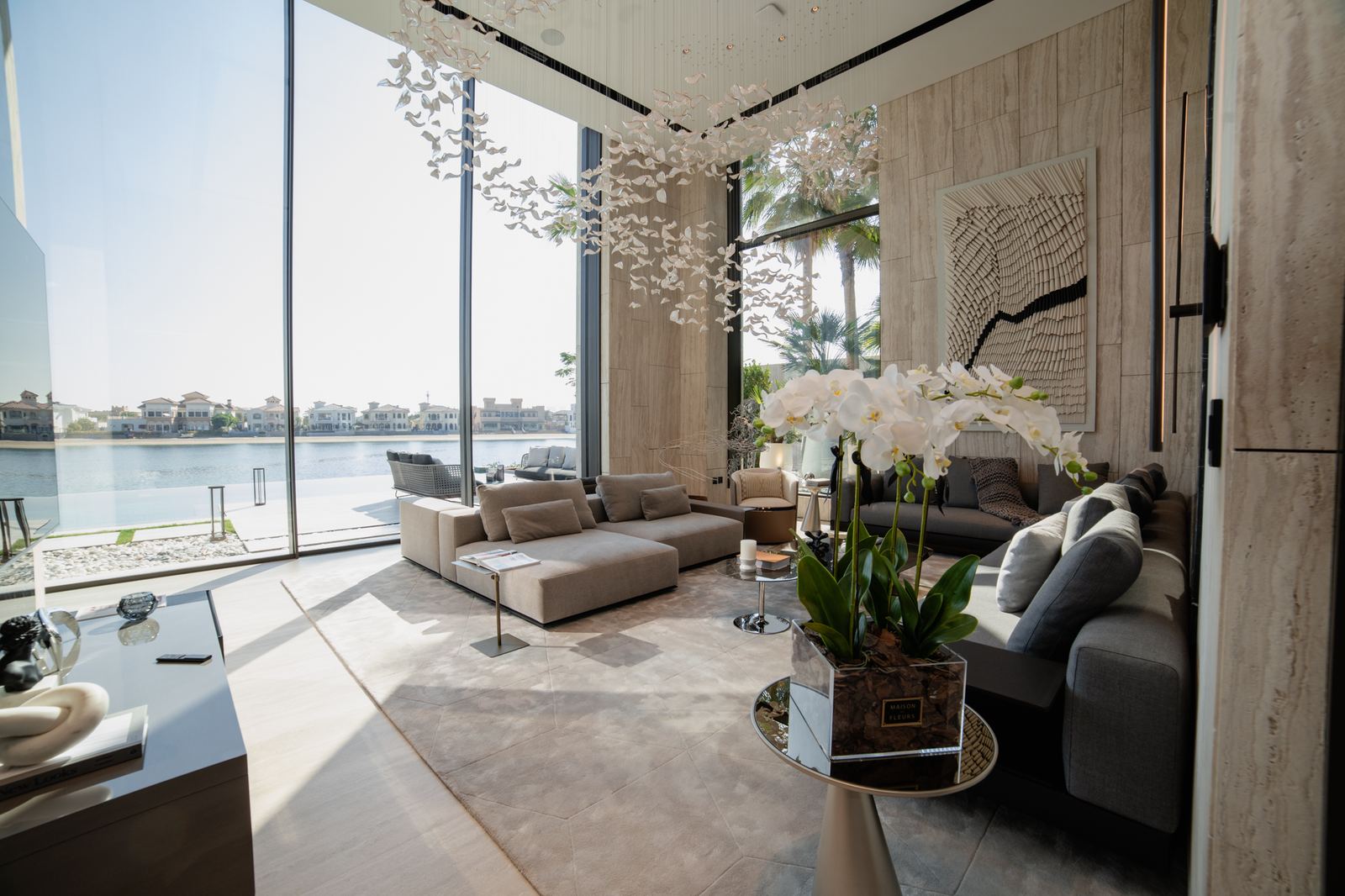 Double-height lounge overlooking the water