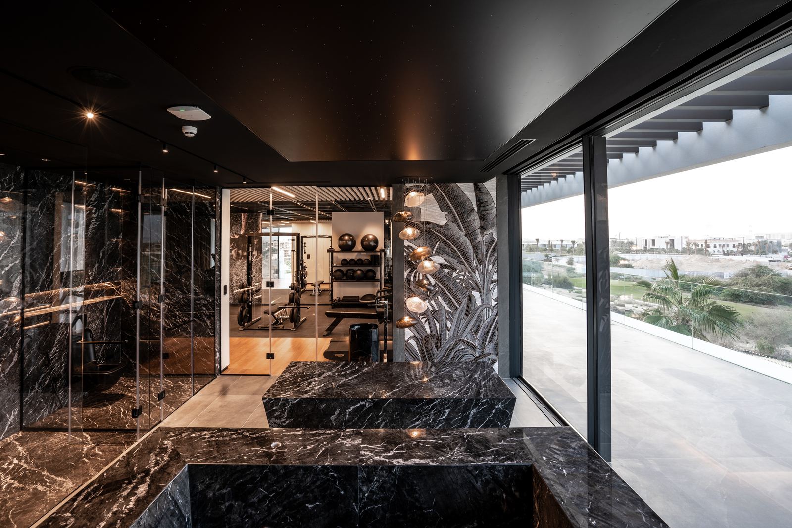 Wellness wing with marble finishes and lounge access